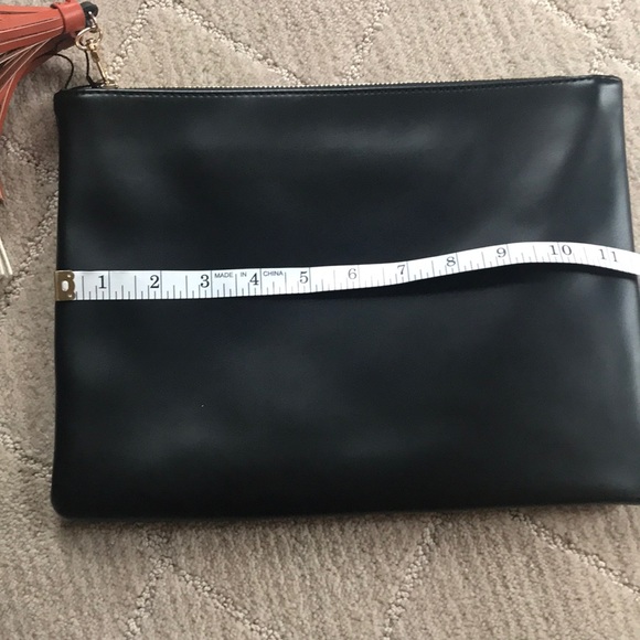 Fun fringe brand new black clutch with tassels! - Picture 4 of 5